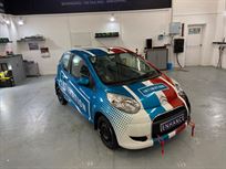 This image was taken in the vehicle wrap workshop before the car was raced.