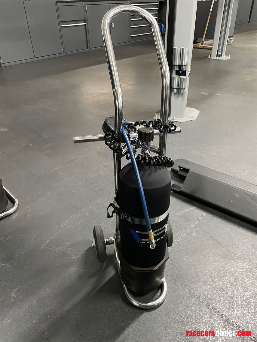 Single carbon dive bottle on trolley
