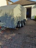 brian-james-covered-trailer-with-folding-tow