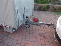 brian-james-covered-trailer-with-folding-tow