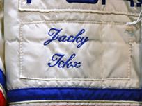 jacky-ickx-rothmans-porsche-race-suit