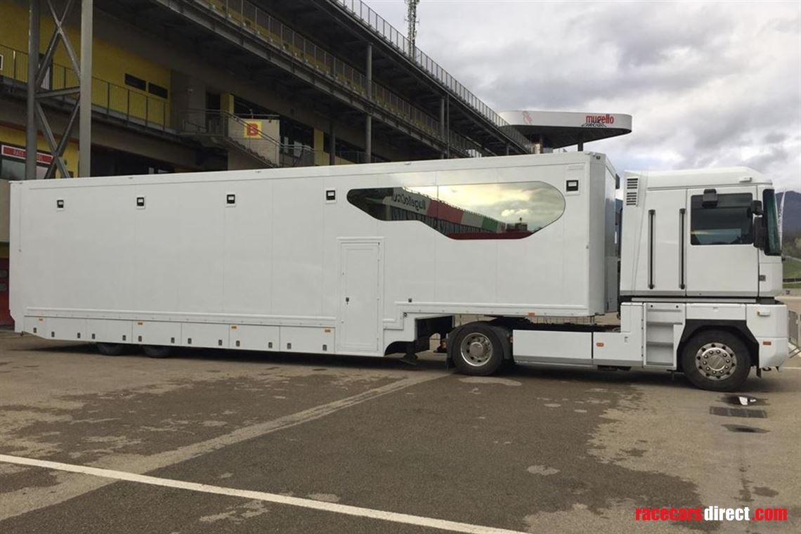 race-trailer-awning-and-plastic-floor