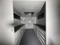 race-trailer-awning-and-plastic-floor