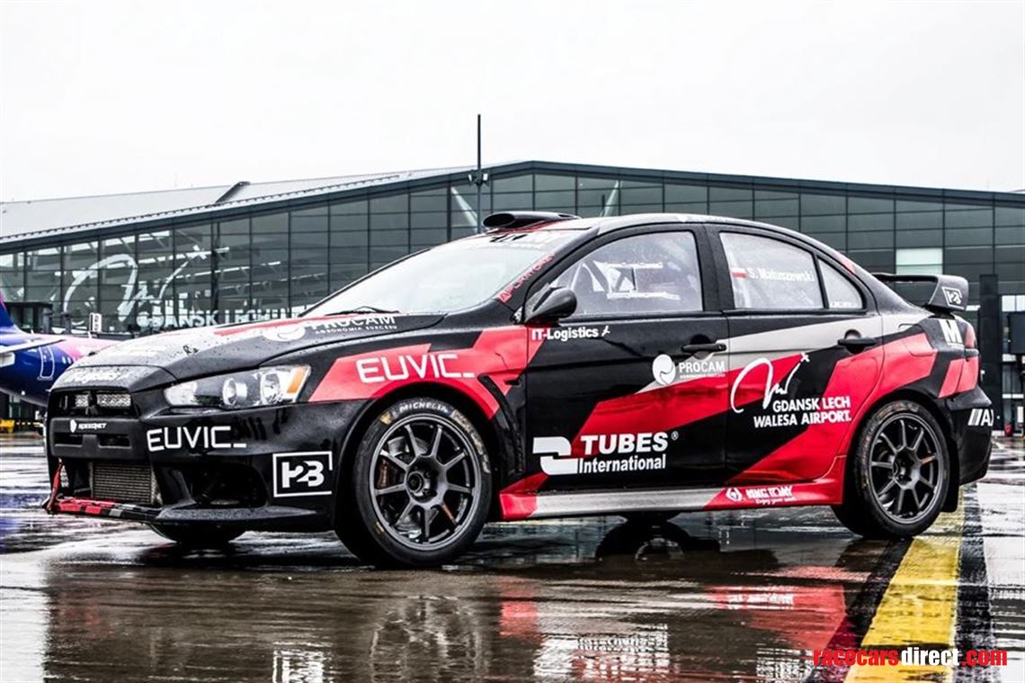 Modified Mitsubishi Lancer Evolution MODIFIED EVO V: THE EMPEROR'S NEW