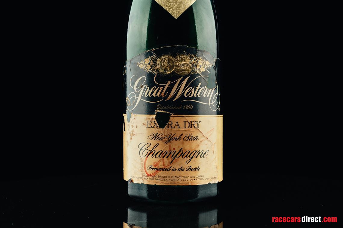 gilles-villeneuve-singed-bottle