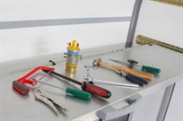 HINGED WORK BENCH & STORAGE COMPARTMENT