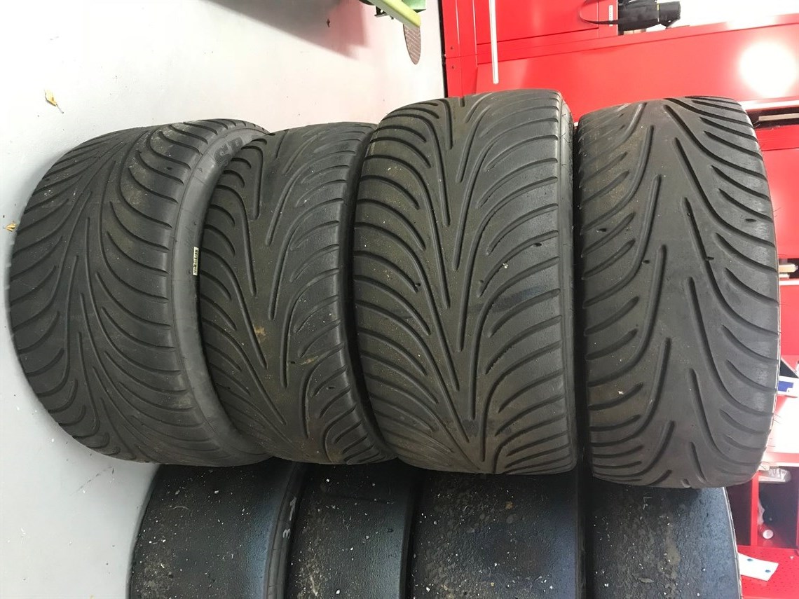 set-of-four-radical-wheels-wet-tyres