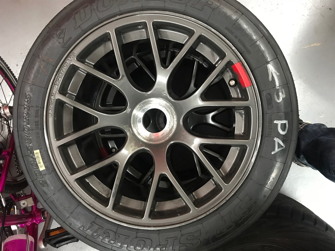 set-of-four-radical-wheels-wet-tyres